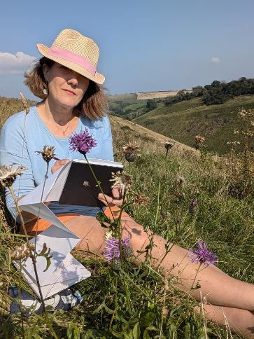 Bonnita Apperley sketching an painting on Devil's Dyke on the South Downs in Sussex